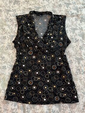 Sleeveless Black Top with Circular Print and wrap detail